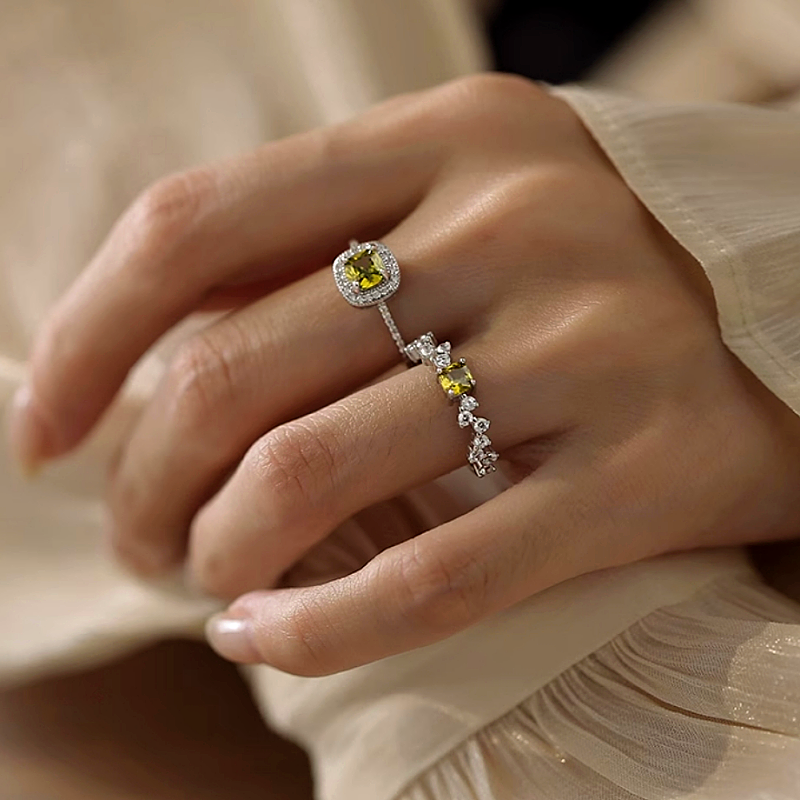 Sterling Silver Diamonds And Olive Green Zircon Rings